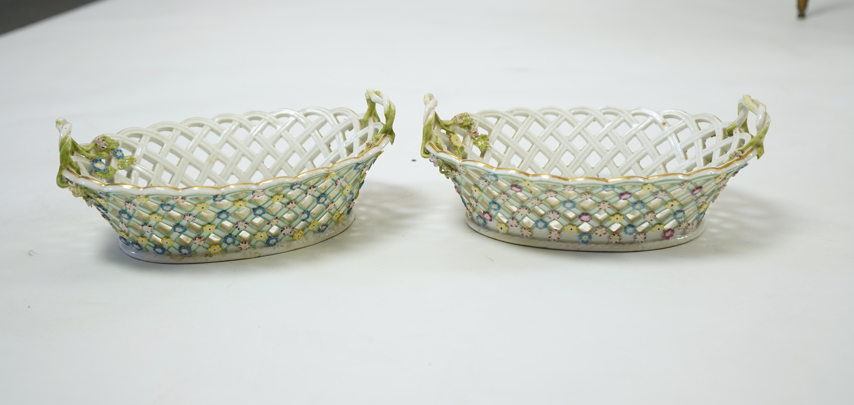 A pair of mid 18th century Meissen porcelain reticulated baskets c.1765